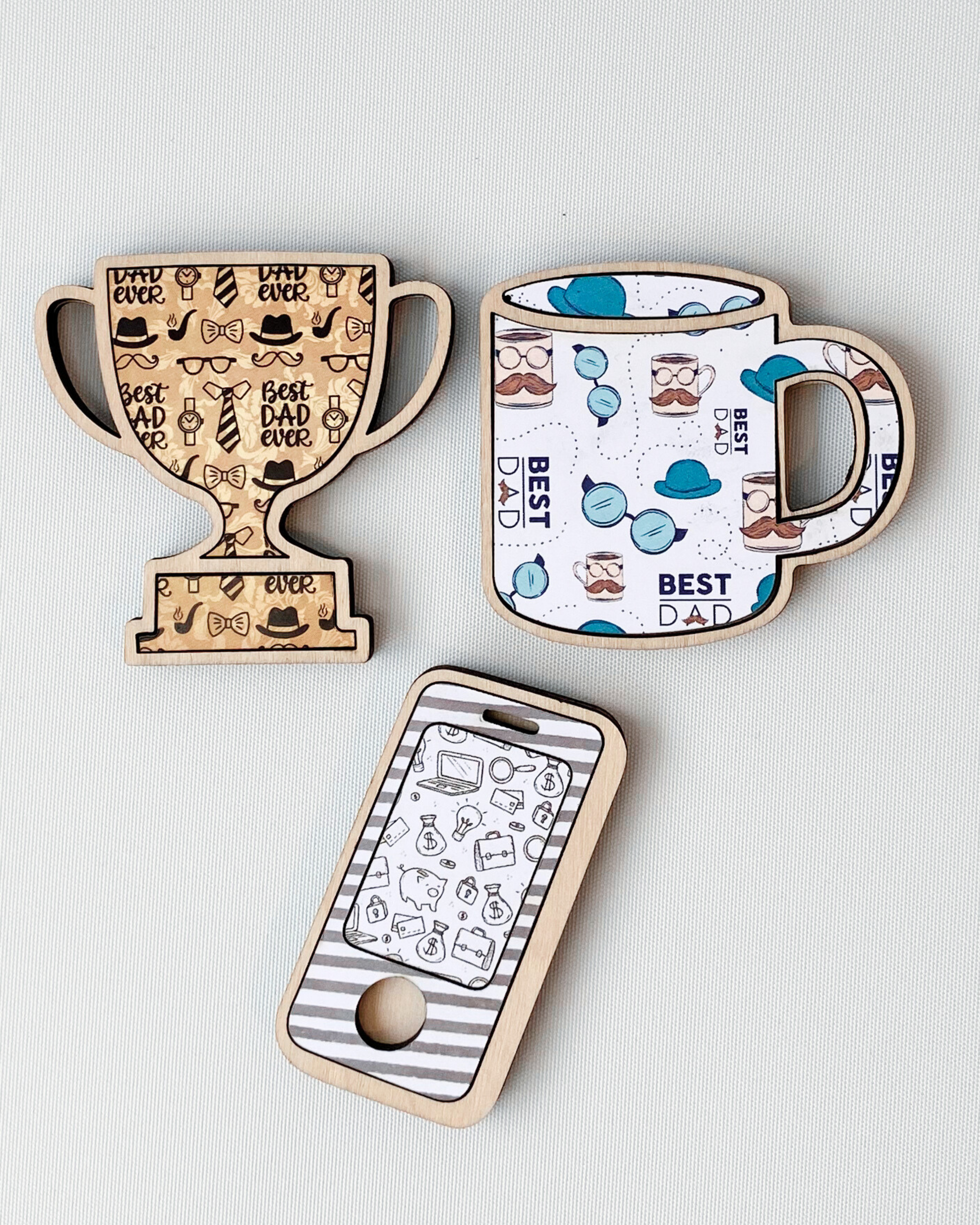 Dad Magnets set of three with Trophy Phone and Mug options, made out of laser-cut plywood.