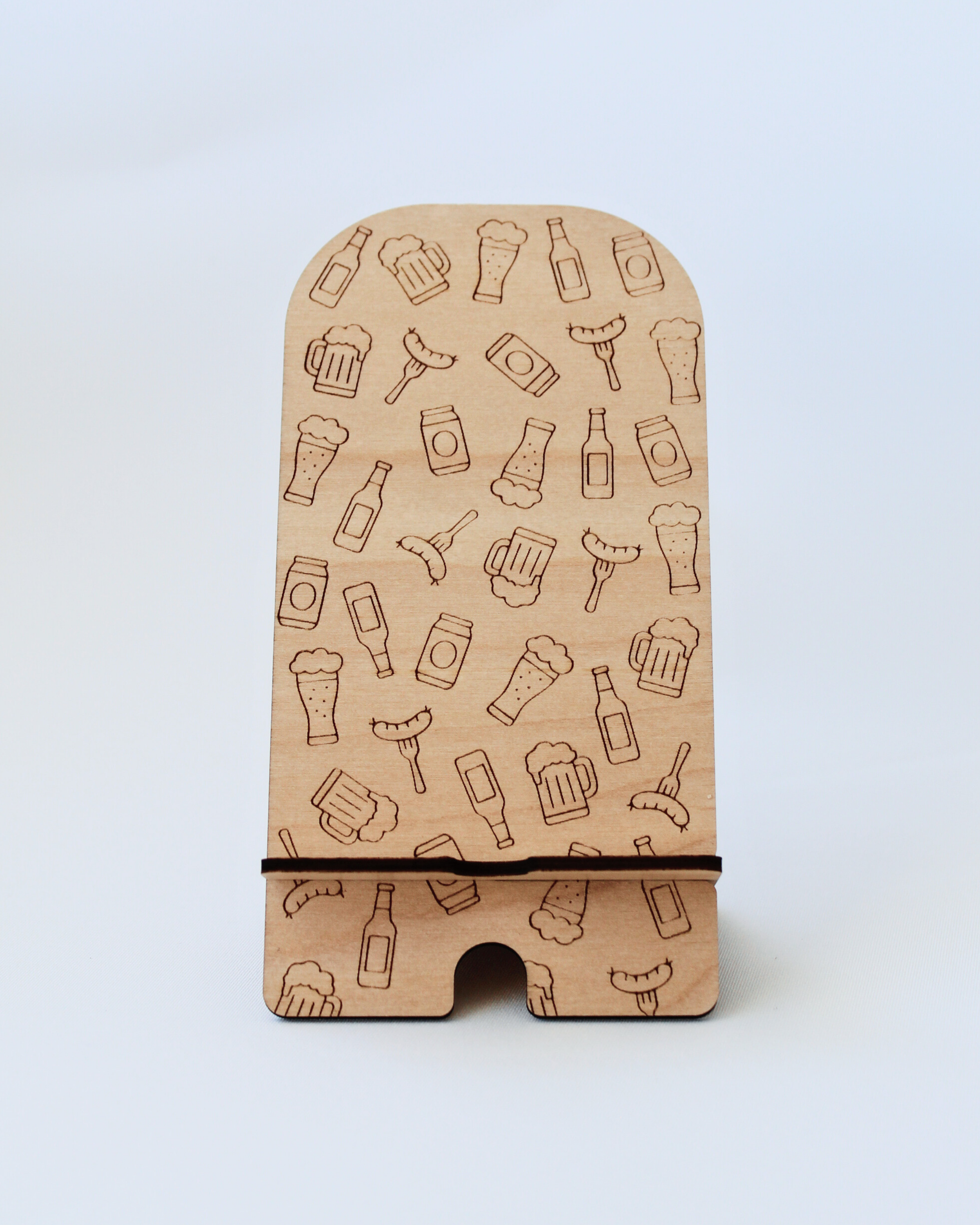 Wooden Phone Stand in the Beer & Sausages design against a white background.