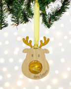 Laser-cut wooden Sweet-Nose Reindeer Ornament in gold with a Lindt chocolate nose, engraved with the words Merry Christmas.